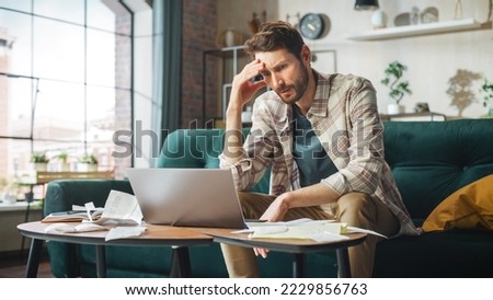 Stressful Accounting at Home: Man Using Laptop, Filling Tax Forms. Worried Male Has Paperwork Problems with Bills and Invoices. Budget Deficit, High Inflation, Financial Difficulty, Debt, Bankruptcy Royalty-Free Stock Photo #2229856763