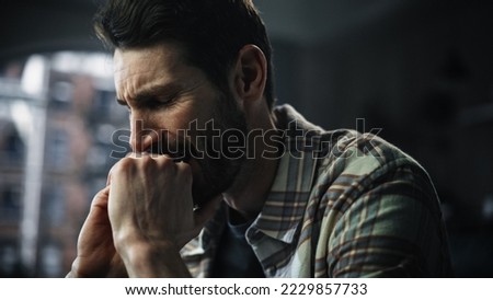 Portrait of Emotional Man Crying, Stressed, Having Mental Problems, Dealing with Death in the Family, Loneliness. Male Suffering from Depression, anxiety or other Treatable Disorders Royalty-Free Stock Photo #2229857733