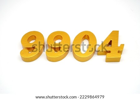      Number 9904 is made of gold-painted teak, 1 centimeter thick, placed on a white background to visualize it in 3D.                                