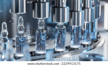 Macro Shot of Medical Ampoule Production Line at Modern Modern Pharmaceutical Factory. Glass Ampoules are being Filled. Medication Manufacturing Process. Royalty-Free Stock Photo #2229913175