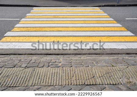 yellow and white lines of crossing isolated, close-up