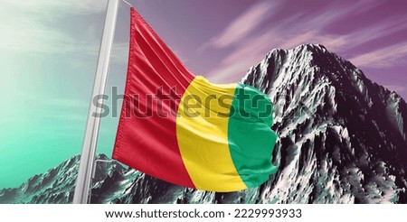 Guinea national flag cloth fabric waving on beautiful Background.
