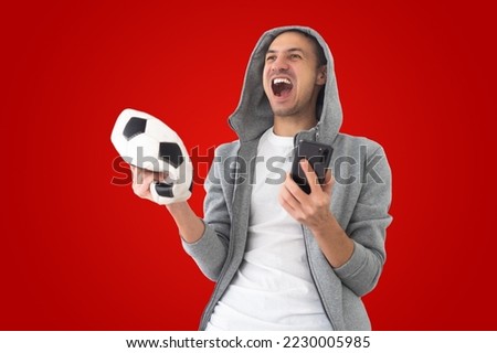 football fan with a deformed ball