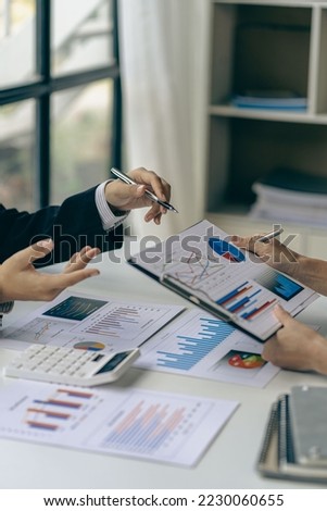 Credit finance business team explain business report from data analysis or bank marketing for credit, tax, bank account balance and cost calculation. vertical image Royalty-Free Stock Photo #2230060655