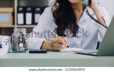 Business team present. Photo professional investor working new startup project. Finance meeting.Digital tablet laptop computer smart phone using, keyboard docking screen foreground,filter