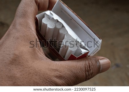 the shape of the cigarette filter is white