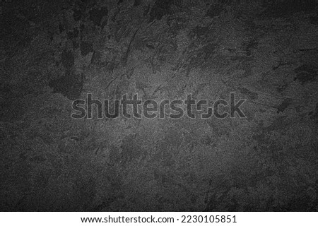 Texture of gray decorative plaster or concrete with vignette. Abstract grunge background for design.