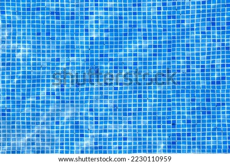 water surface below the pool floor blue background texture. selective focus . High quality photo