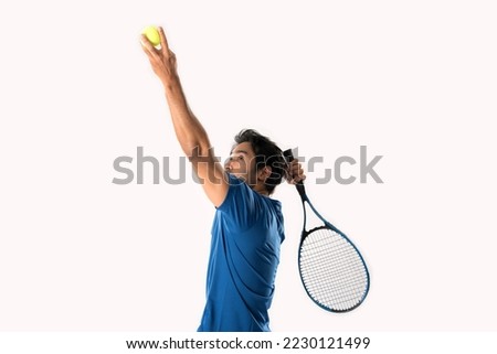 Male tennis player playing tennis with striving for victory gesture on white background.