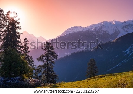 Sunrise in the mountains. These are the scenic meadows of the Parvati valley Himalayan region. Peaks and alpine landscape from the trail of Sar Pass trek, Himalaya, Kasol, Himachal Pradesh, India.	