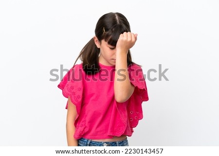 Little caucasian kid isolated on white background with headache