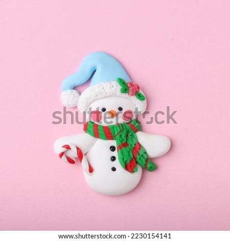 Cute Snowman Handmade From Modeling Clay Or Plasticine for merry Christmas holiday