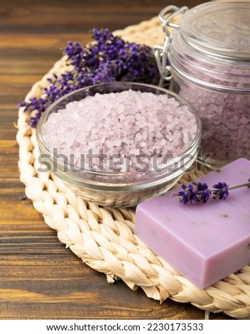 Lavender flowers, fragrant sea salt and handmade soap. The concept of spa, beauty and health salon, skin care cosmetics. Natural cosmetics.Aroma procedures. Close up photo on white wooden background.