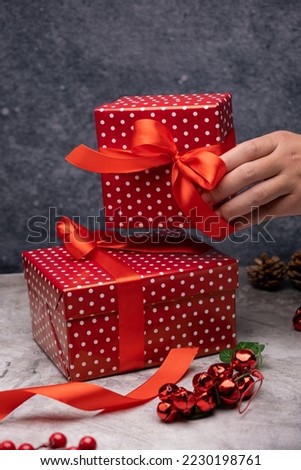 Hand holding Christmas gifts, Christmas concept