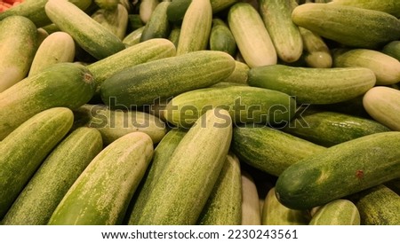 Cucumber display for sell in a tradisional market.