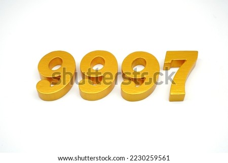   Number 9997 is made of gold-painted teak, 1 centimeter thick, placed on a white background to visualize it in 3D.                                    