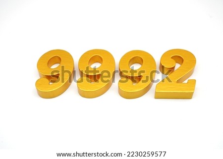   Number 9992 is made of gold-painted teak, 1 centimeter thick, placed on a white background to visualize it in 3D.                                    