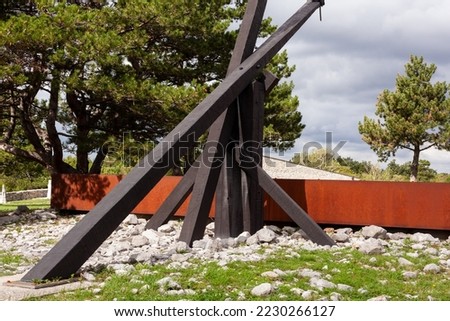 Foibe di Basovizza. Memorial site at one of the sinkholes used for disposing of bodies of those killed in the massacres perpetrated by Yugoslav partisans at the end of WWII, Trieste. Italy Royalty-Free Stock Photo #2230266127