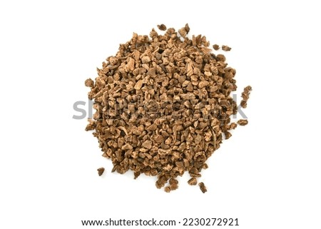 Dried Valerian root pieces (Valeriana officinalis), closeup Valerian herb root used in herbal medicine as a tranquillizer and to treat insomnia, anxiety, hypertension, pain relief. Tea ingredients.  Royalty-Free Stock Photo #2230272921