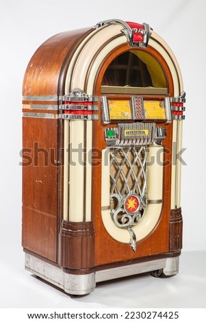 Old jukebox music player isolated on white background