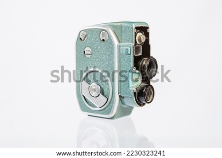 Old 8mm Movie Camera isolated on white. Vintage old video camera isolated on white