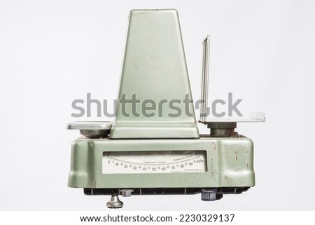 Isolated old weight against a white background.