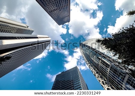 Skyscrapers towering Shinjuku, Tokyo, Japan on a sunny afternoon Royalty-Free Stock Photo #2230331249
