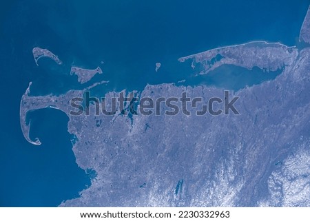 Aerial view of Cape Cod, Massachusetts and Long Island, New York from space. Digitally enhanced.  Elements of this image furnished by NASA. 