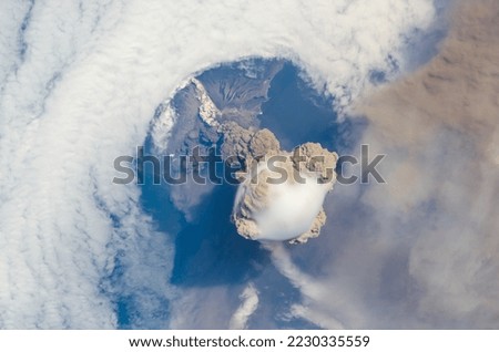 Sarychev Volcano eruption aerial view from above in Russia. Digitally enhanced. Elements of this image furnished by NASA. 