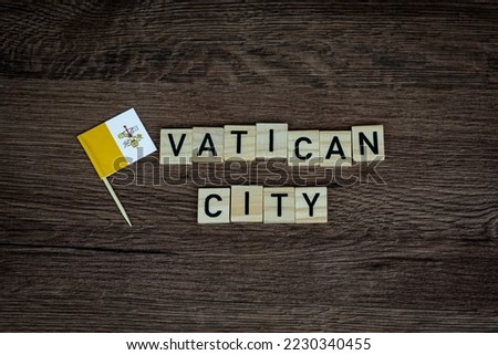 Vatican City - wooden word with vatican flag (wooden letters, wooden sign)