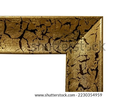 Close-up fragment of vintage golden wooden frame for picture, mirror or photo isolated on white background with clipping path. Cracked paint with black cracks on gold surface