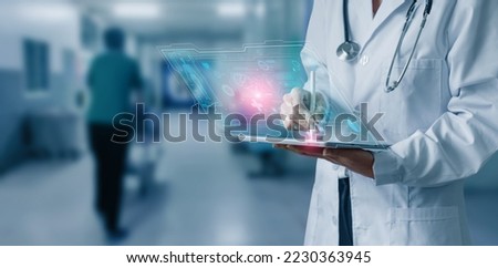 Digital health care innovative virtual science and medicine technology concept, Doctor working with human anatomy virtual interface icons.   Royalty-Free Stock Photo #2230363945