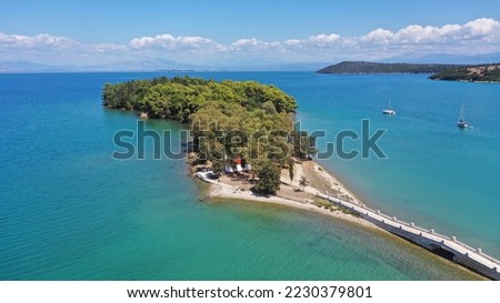 Aerial drone photo of small islet of Koukoumitsa in picturesque seaside village of Vonitsa, Western Greece Royalty-Free Stock Photo #2230379801
