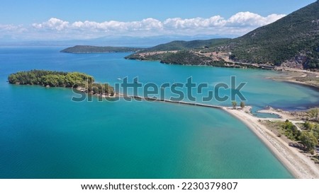 Aerial drone photo of small islet of Koukoumitsa in picturesque seaside village of Vonitsa, Western Greece Royalty-Free Stock Photo #2230379807