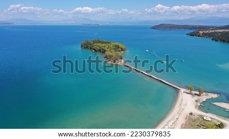 Aerial drone photo of small islet of Koukoumitsa in picturesque seaside village of Vonitsa, Western Greece Royalty-Free Stock Photo #2230379835