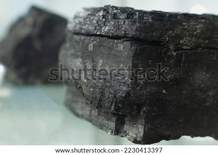 Dark coal texture, coal mining, fossil fuels.