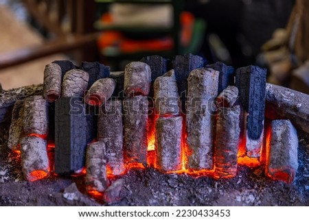 Burning charcoals. Burning red charcoal to prepare Turkish coffee on embers.