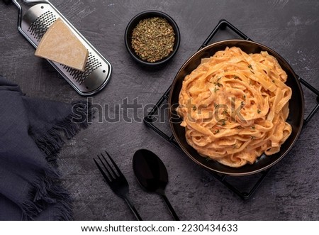 Food photography of tagliatelle, pasta, noodles, cheese, parmesan, sauce