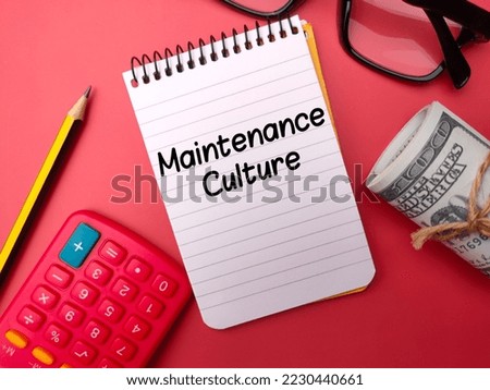 Notebook,pencil and banknotes with the word Maintenance culture on red background.