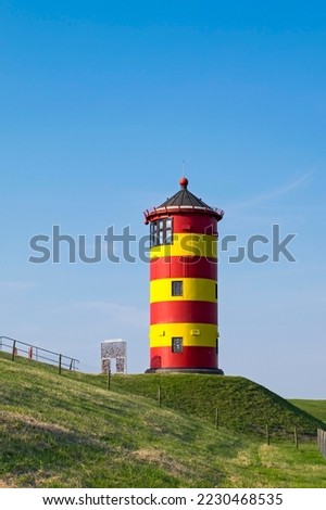 Pilsum lighthouse, Pilsum, East Frisia, Lower Saxony, Germany Royalty-Free Stock Photo #2230468535