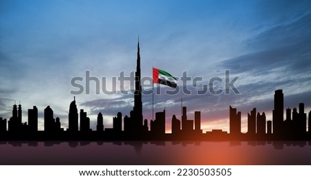 United Arab Emirates flag and Dubai skyline view at sunset. UAE celebration. National day, Flag day, Commemoration day, Martyrs day. Royalty-Free Stock Photo #2230503505