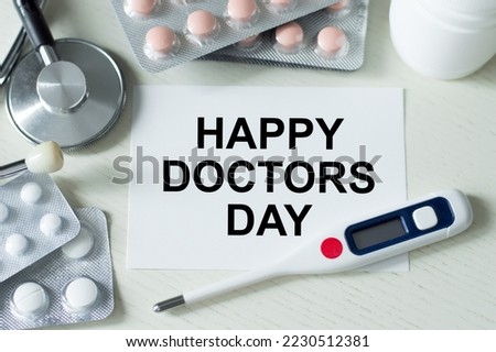 Happy Doctors Day wording with stethoscope. Medical concept