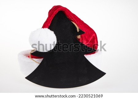 Christmas tree chalkboard slate mockup and santa claus hat on white background