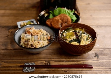 cooked rice with yam and tuna and croquette Royalty-Free Stock Photo #2230575693