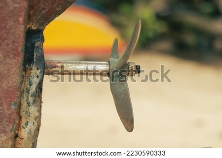 engine propeller under the boat with copy space and blur background