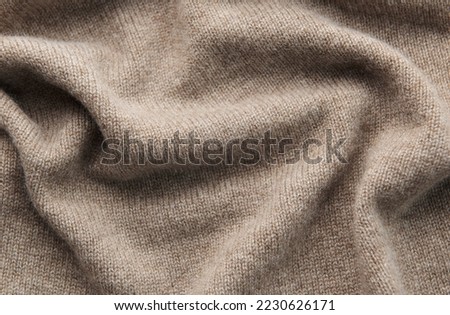 Fine grey cashmere texture close-up. Warm cashmere fabric as background, top view Royalty-Free Stock Photo #2230626171