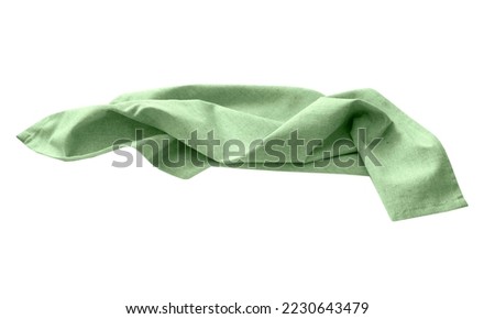 Green kitchen towel isolated. Food decor. Crumpled dish cloth. Textile napkin. Royalty-Free Stock Photo #2230643479