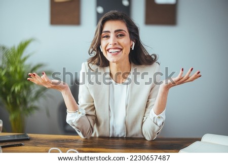 Happy business woman smiling face waving hand talking to webcam recording vlog, social media influencer streaming, making video call at home. Headshot portrait. Webcam view