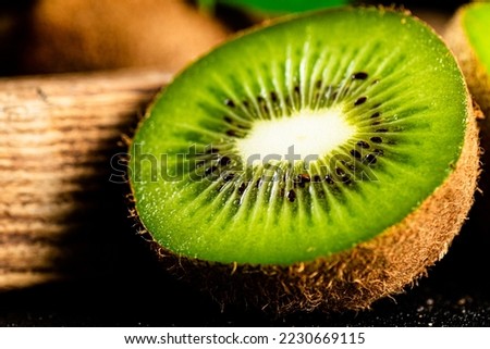 Half a ripe kiwi. Macro background. High quality photo