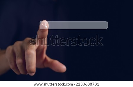 Businessman showing Search Bar On Virtual Screen, Data Search Technology Search Engine Optimization.